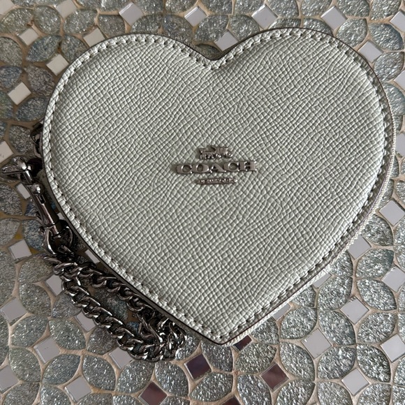 Coach Handbags - Coach Heart-Shaped Silver Coin Purse in EUC. Almost a sage to light grey color.